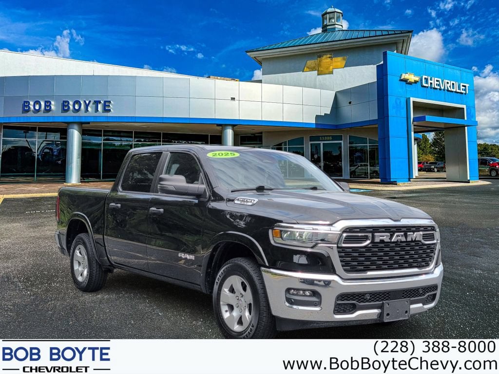 2025 RAM 1500 Big Horn in Black — front three-quarter view