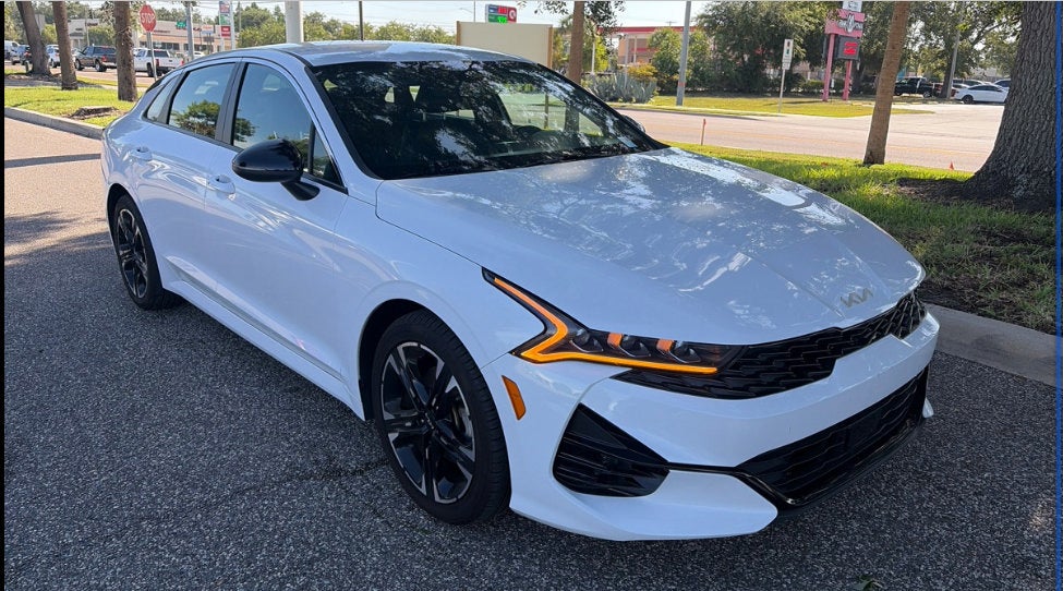 2023 Kia K5 GT-Line in White — front three-quarter view